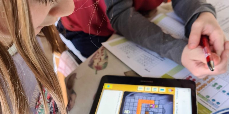 A girl doing digital making on a tablet