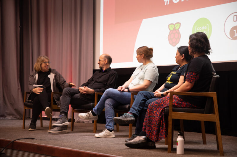 A panel discussion on stage at the Clubs Conference.