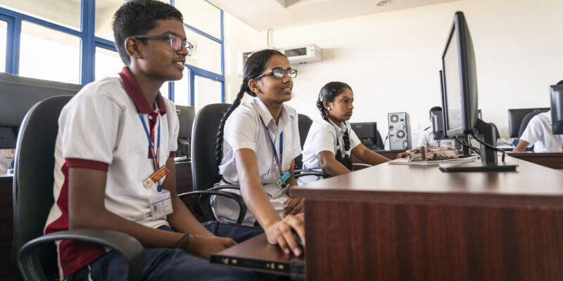 Learners in a computing classroom.