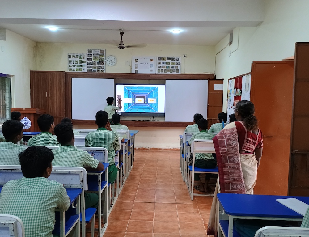 A group of students in a classroom.