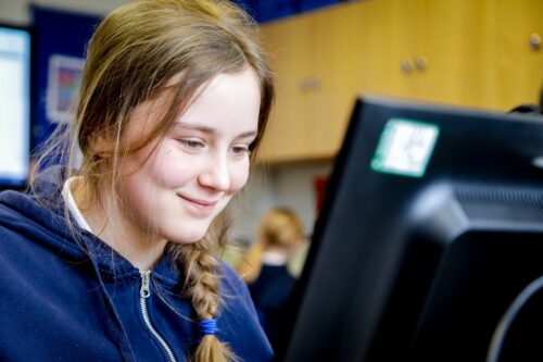 Learner in a computing classroom.