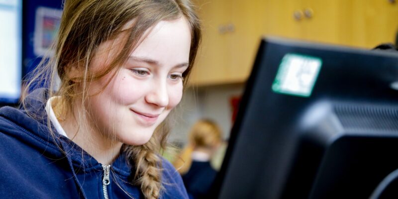 Learner in a computing classroom.