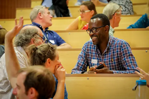 A speaker at a research seminar.