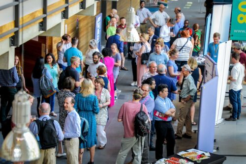 Educators and researchers at an event. 