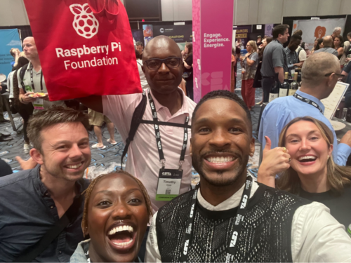 A group of educators taking a selfie at a conference. 